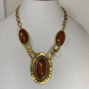 Large oval brown bead medallion style necklace